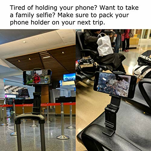 Phone holder with suitcase and chair setup for selfies.